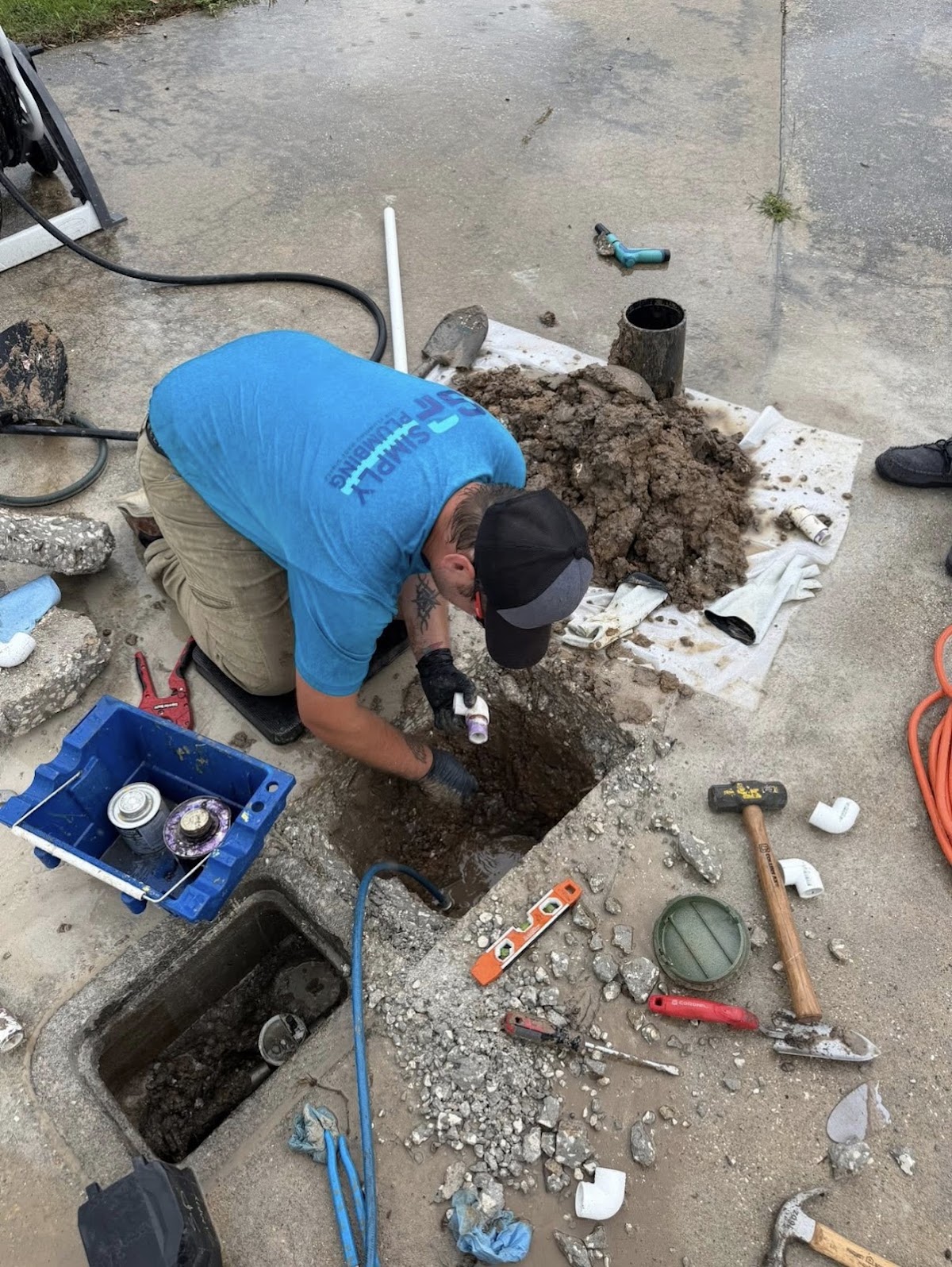 Digging down to a sewer line through a concrete slab